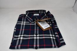 An as new Burberry Caxton shirt (XL - RRP £350, requires washing).