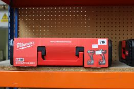 An as new Milwaukee M18 BLPP2A2-502X 18V Combi Drill/Impact Driver Twin Kit (Includes two