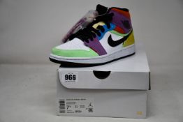 A pair of women's as new Nike Air Jordan 1 Mid SE (UK 5).
