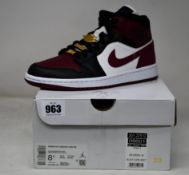 A pair of women's as new Nike Air Jordan 1 Mid SE (UK 6).
