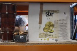 A single drum bongo, Yamaha soprano, a Sbr Sabian drum symbol and a ukulele.