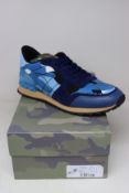 A pair of as new Valentino Garavani camouflage sneakers (EU 43).