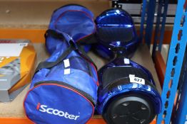 Two pre-owned hoverboards to include an iScooter (Some damage to board) and a NEOMOTION Z1+ (