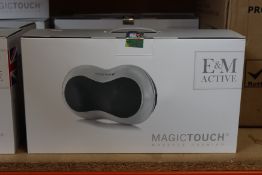 A boxed as new E & M Active Magic Touch Massage Cushion (RRP £118) https://emactive.com/em-active/