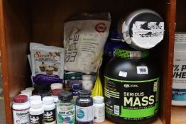 A quantity of assorted supplements and related items.