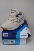 A pair of as new Mizuno Sky Medal trainers (UK 9).