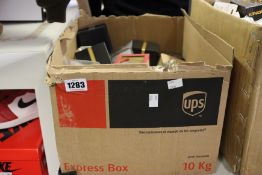 A box of assorted jewellery to include watches and earrings.