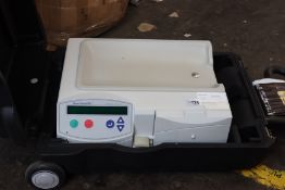A pre-owned Baxter HomeChoice automated peritoneal dialysis system with case.