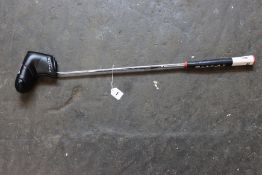 A pre-owned Wilson infinite west loop putter (Right handed).