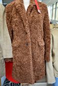 A women's as new Hugo Boss button through coat in Teddy fabric (UK 8 - RRP £350).