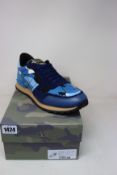 A pair of as new Valentino Garavani camouflage sneakers (EU 45).