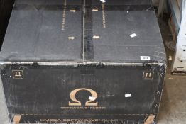 A boxed Secret Lab Omega 2020 black gaming chair.