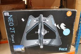 A boxed Tacx Neo 2T smart trainer.