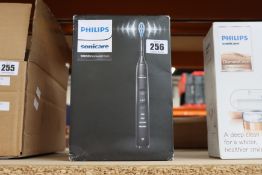 A boxed as new Philips Sonicare 9000 DiamondClean electric toothbrush in black (Box slightly