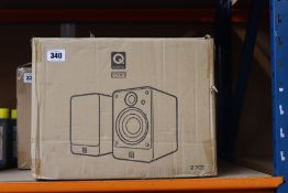 A pair of boxed as new Q Acoustics 2010i Bookshelf Speakers.