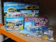 An as new Playmobil City Life petrol station 168pc, one as new Playmobil City Life grooming parlour,
