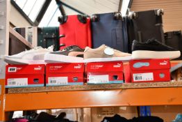 Four pairs of women's as new Puma Soft Foam trainers; Carina Slim (UK 5), Flyer Runner (UK 6),