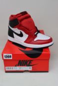 A pair of women's as new Nike Jordan 1 Retro High Satin Snake Chicago (UK 4).