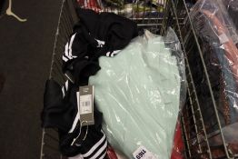 A quantity of as new Adidas sportswear and accessories.