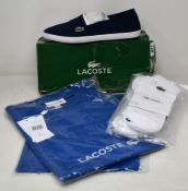 Two as new Lacoste blue T-shirts (FR 2, 3), two packs of Lacoste socks and a pair of Lacoste