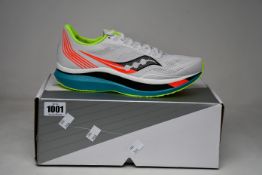 A pair of as new Saucony Endorphin Pro trainers (UK 9).