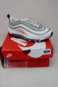 A pair of as new Nike Air Max 97 trainers (UK 5.5).