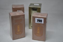 Three bottles of Hugo Boss The Scent Private Accord eau de parfum (50ml) and a bottle of Hugo Boss