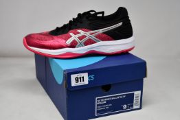 A pair of women's as new Asics Netburner Ballistic FF trainers (UK 7).