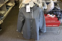 An as new Stutterheim Stockholm jacket (XS).