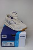 A pair of as new Mizuno Sky Medal trainers (UK 7.5).
