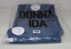 A pair of as new Donna Ida Minnie The High Top Flare jeans (W24 - RRP £215).