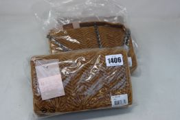 Three as new Unmade Copenhagen Janel clutch bags in bronze brown (RRP £75 each).