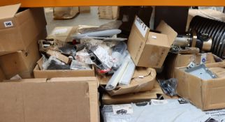 A shelf of industrial and related items.