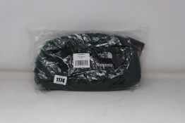 An as new the North Face Supreme faux fur waist bag in green.