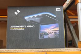 A boxed as new Automotive Audio (Ceiling and plug-in) vehicle video system for business and travel.