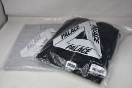 An as new Palace Sofar zip hoodie (L) and Palace Basically A Tri-Ferg T-shirt (L).