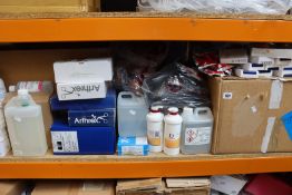 Two shelves of medical items.