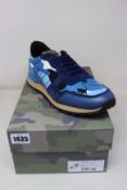 A pair of as new Valentino Garavani camouflage sneakers (EU 43).