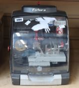 A pre-owned Silca Futura digital key cutting machine (Slight damage to casing, may need repairs).
