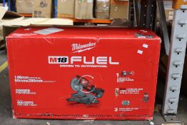 A boxed Milwaukee M18 FMS254 Fuel double bevel slide mitre saw.