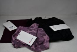 Three items of as new LuluLemon fitness wear; Define jacket (Security tag attached, size 10 - RRP £