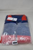 A men's as new Lacoste sportswear set (FR 3 - RRP £190).