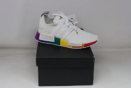 A pair of as new Adidas NMD_R1 Pride trainers (UK 5.5).