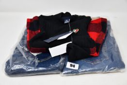 Two pairs of children's as new Tommy Hilfiger jeans (8) and a Tommy Hilfiger dress set (12 months).