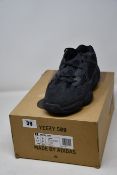 A pair of as new Adidas Yeezy 500 (UK 8.5).