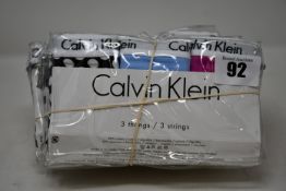 Six packs of Calvin Klein thongs (1 x S, 5 x M, 3 pairs per pack - RRP £33 per pack).