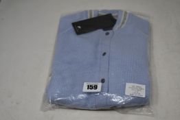 An as new Zoe Jordan Mini Edison cashmere bomber in blue (4-5 years - RRP £135).