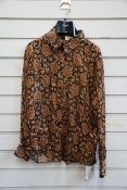 An as new women's Celine Paris silk shirt in black and orange (Size 36 - RRP £558).