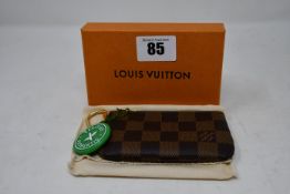 An as new Louis Vuitton key pouch (RRP £175).