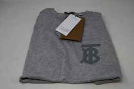 An as new Burberry Emerson monogramed top in grey (S - RRP £350 - Please note item has security
